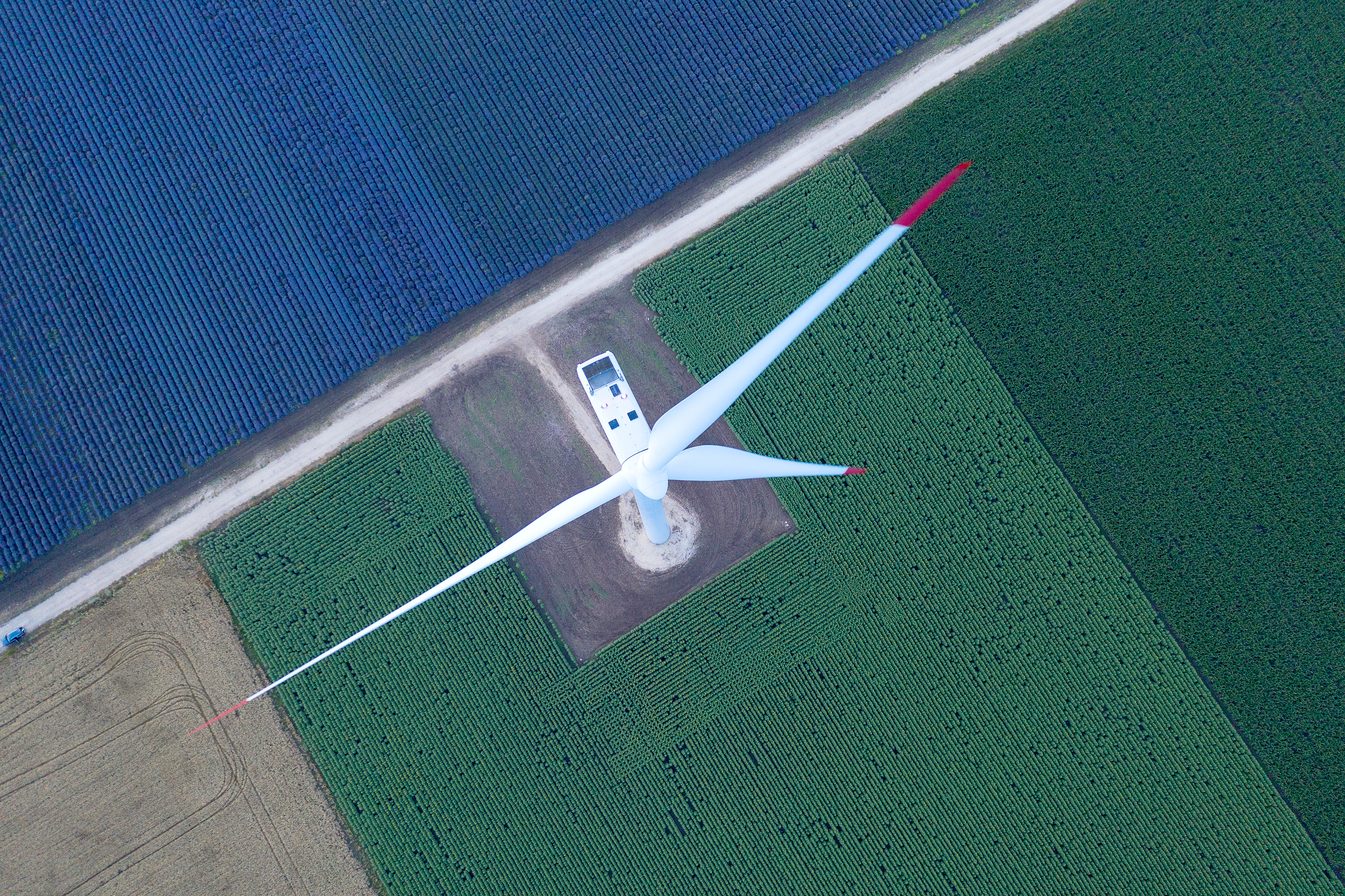 Aerial shot of a windmill, green energy, alternative energy technology 